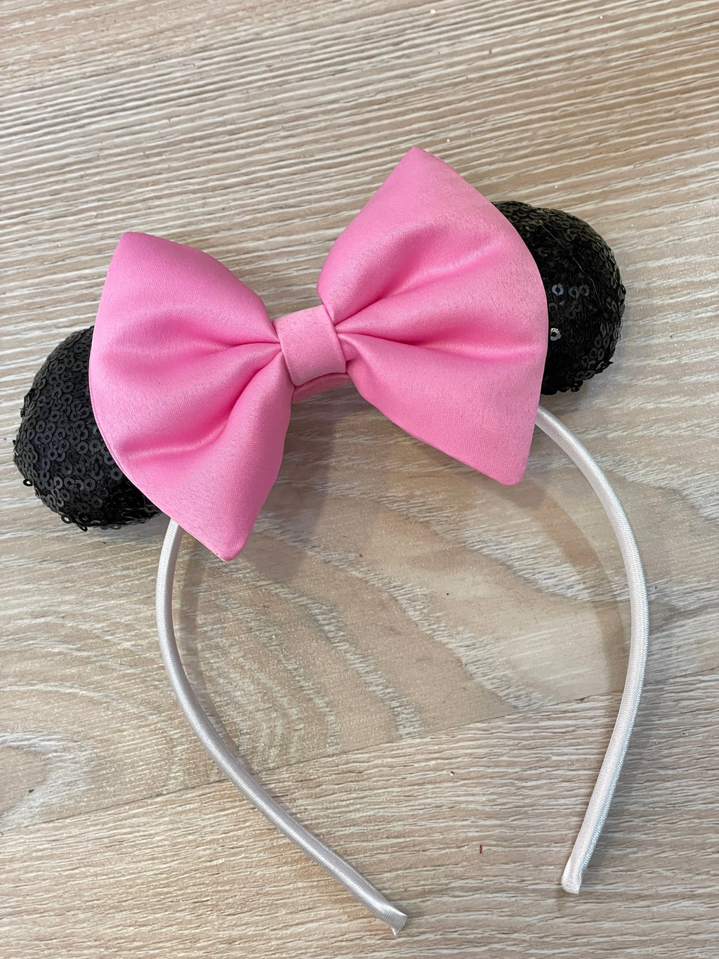 Pink Minnie Mouse dress hair accessory