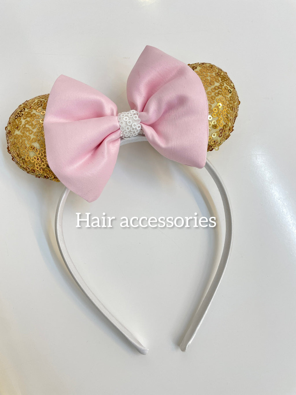 Pink Minnie Mouse dress hair accessory