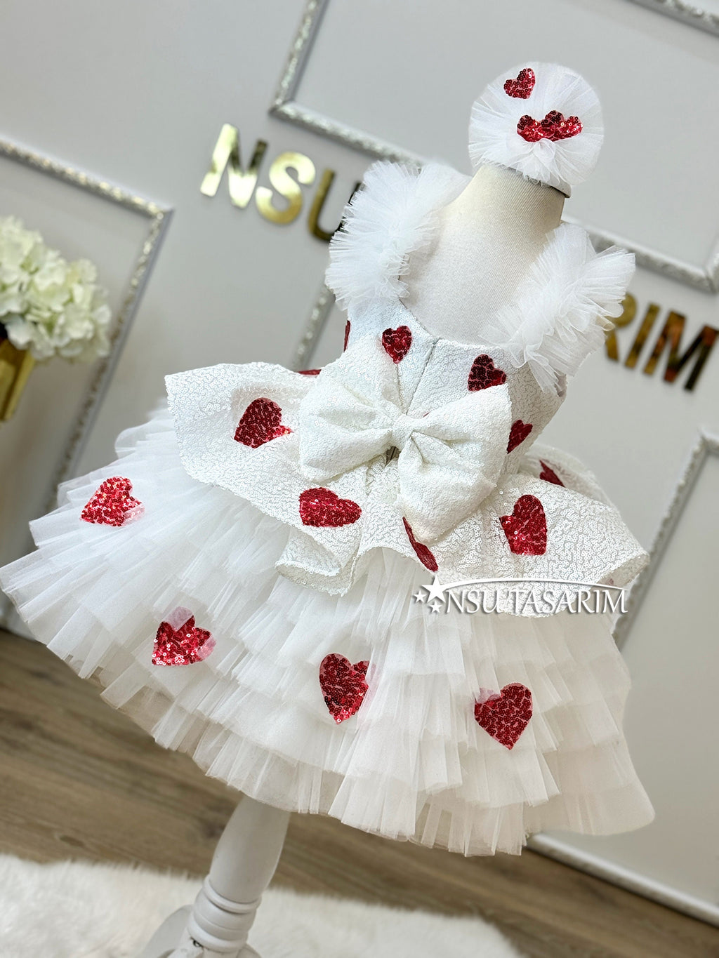 Knee length heart patterned Valentine&#39;s Day dress. Mother daughter shoots.