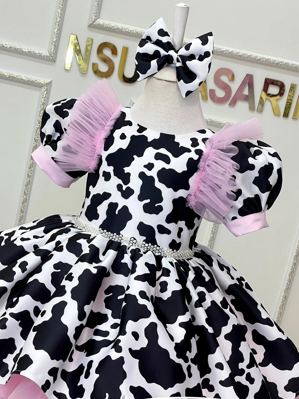 Cow theme costume front side top part detail shot