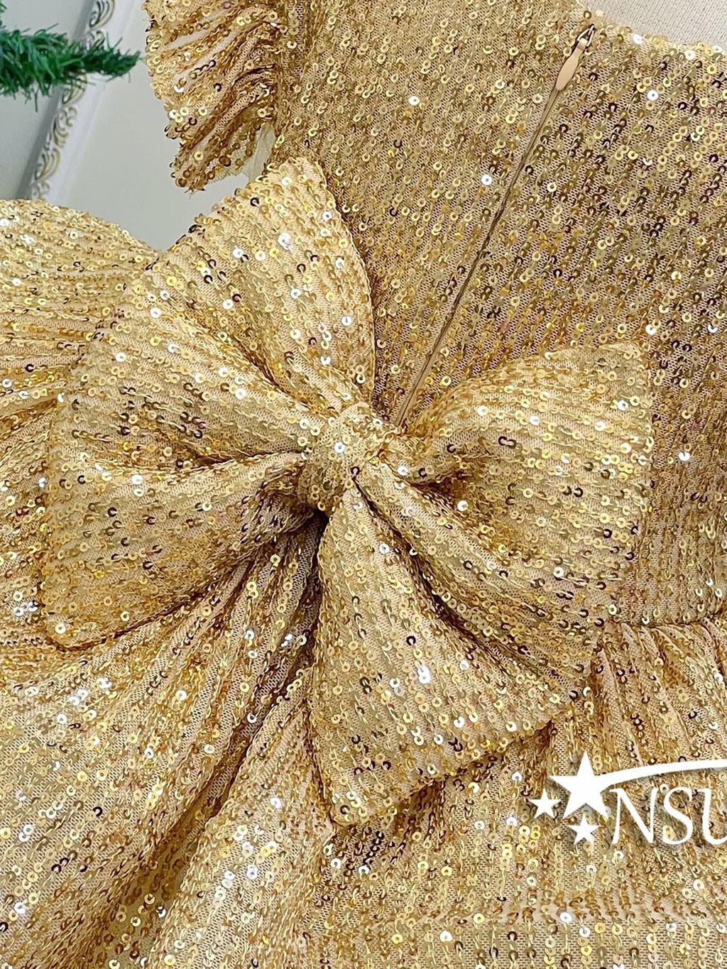 Our Gold Sequin Holiday Dress bow