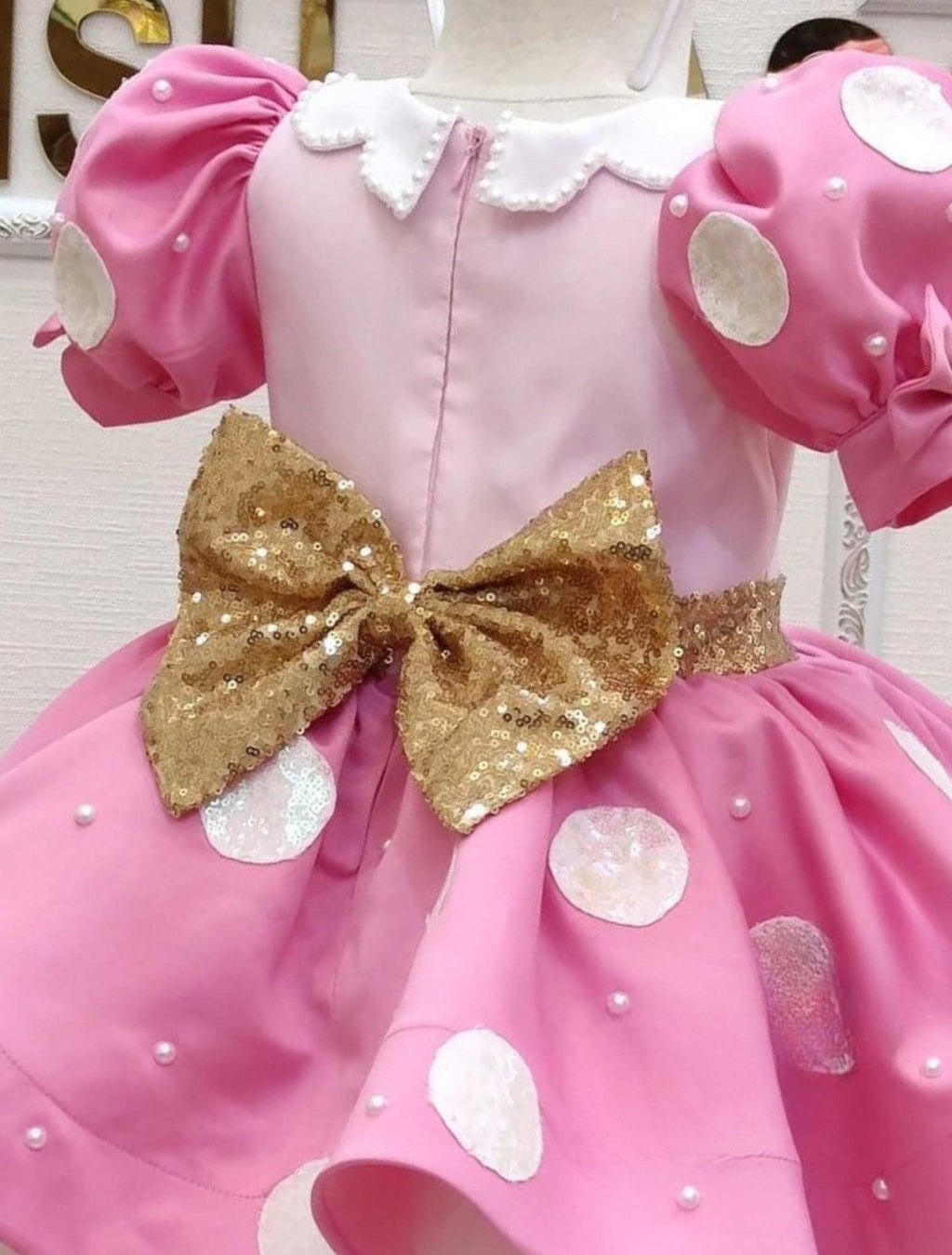 Baby girl pink Minnie Mouse dress with pearl accents for special occasions